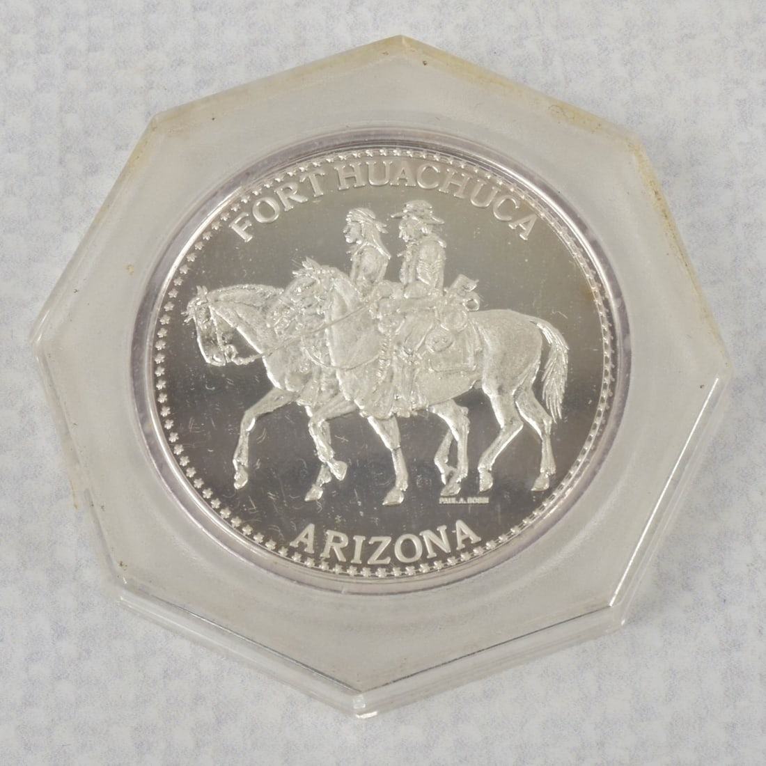Fort Huachuca Arizona .999 Silver Coin: Fort Huachuca Arizona 1877-1977 One (1) Ounce .999 Silver Encapsulated Coin. Kodner Galleries offers phone and absentee bidding at a low, flat 21% buyer?s premium without surcharge or hidden fees.