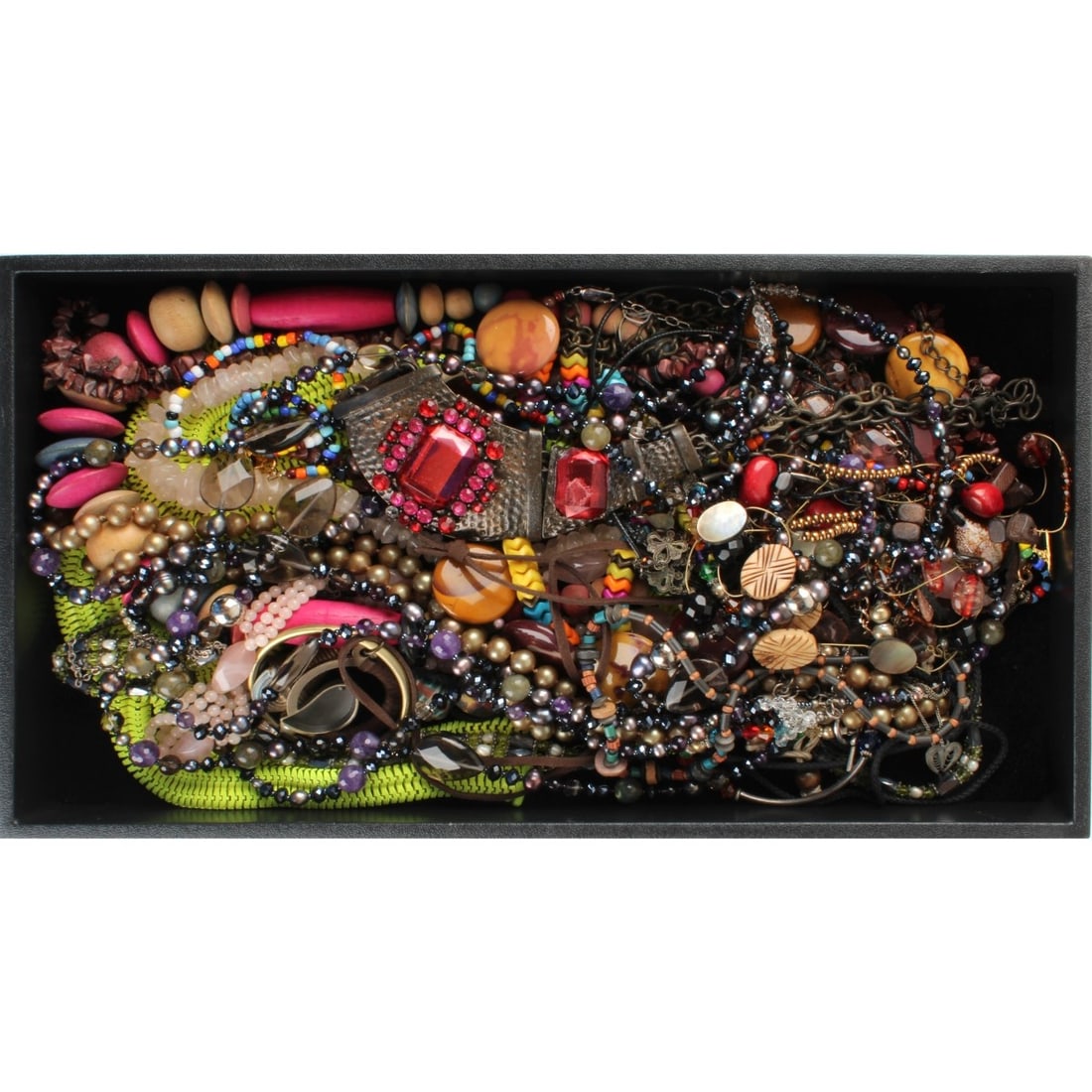 Tray Lot of Fashion Necklaces: Tray Lot of Vintage Fashion Necklaces. Variously accented with quartz, hardstones, wood, glass, faux pearls and more. Various makers and styles. Kodner Galleries offers phone and absentee bidding at a
