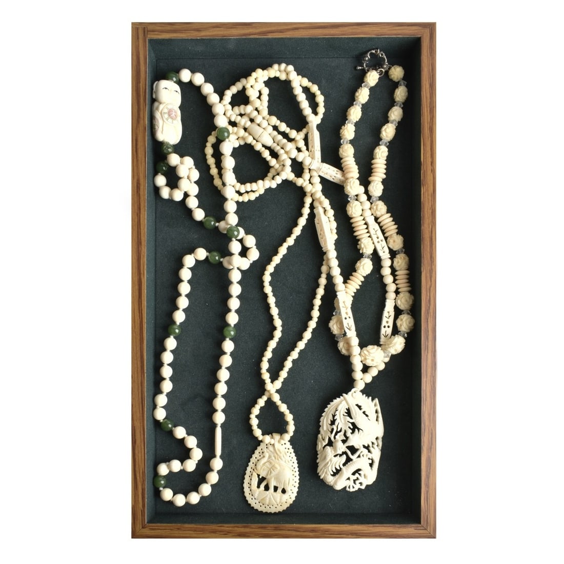 Four Asian Beaded Necklaces: Lot of Four Asian Beaded Necklaces with Pendants. Bead sizes range from 5mm - 10mm. Longest necklace measures 30-1/2" L. We Will Not Ship This Item Out of State of Florida. Anyone Having This Item Shi