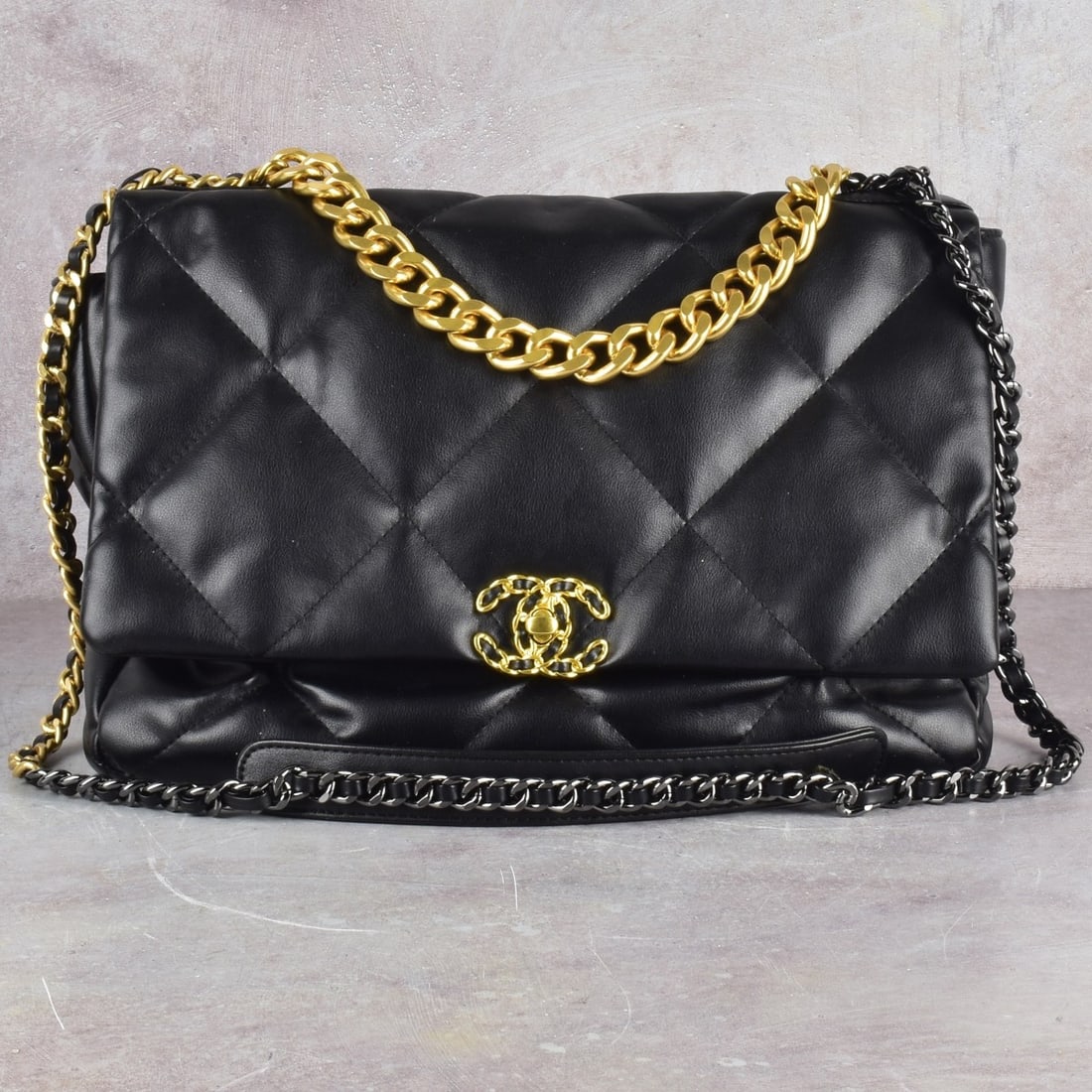 Replica Chanel Flap Bag: Replica Chanel Flap Bag with a Turn Lock Closure in Black Quilted Lambskin Leather with Gold and Black Tone Hardware Having an Interior Zipper Pocket With an Outside Magnetic Closure. and a Red Lined