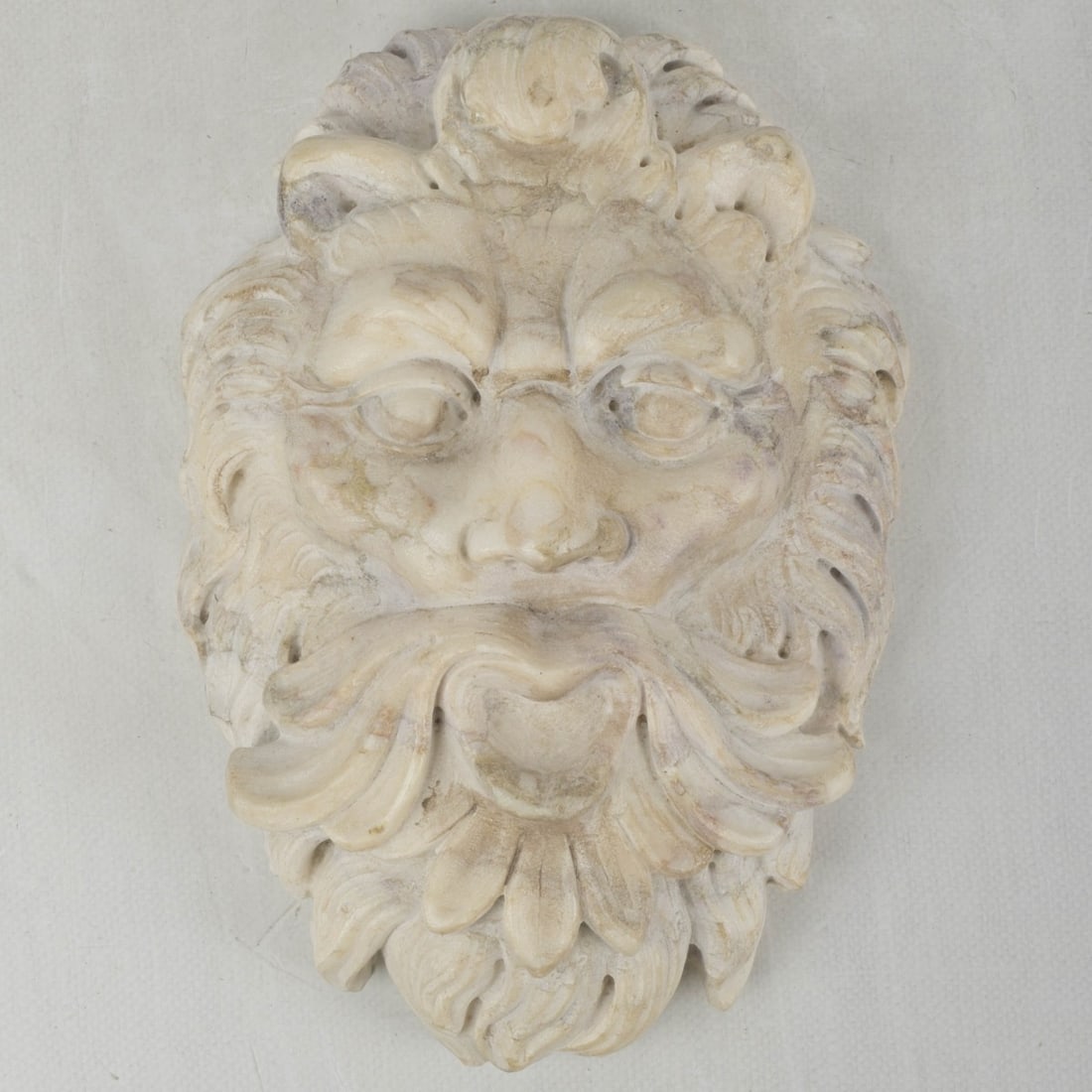 Marble Wall Hanging Face Plaque: Antique Marble Wall Hanging Face Plaque of a Mythological Figure Possible of Zeus or Aeolus. Measures: 13-1/2" high, 9-1/4" wide, 3-1/2" deep. Provenance: From an Important Coconut Grove, Florida
