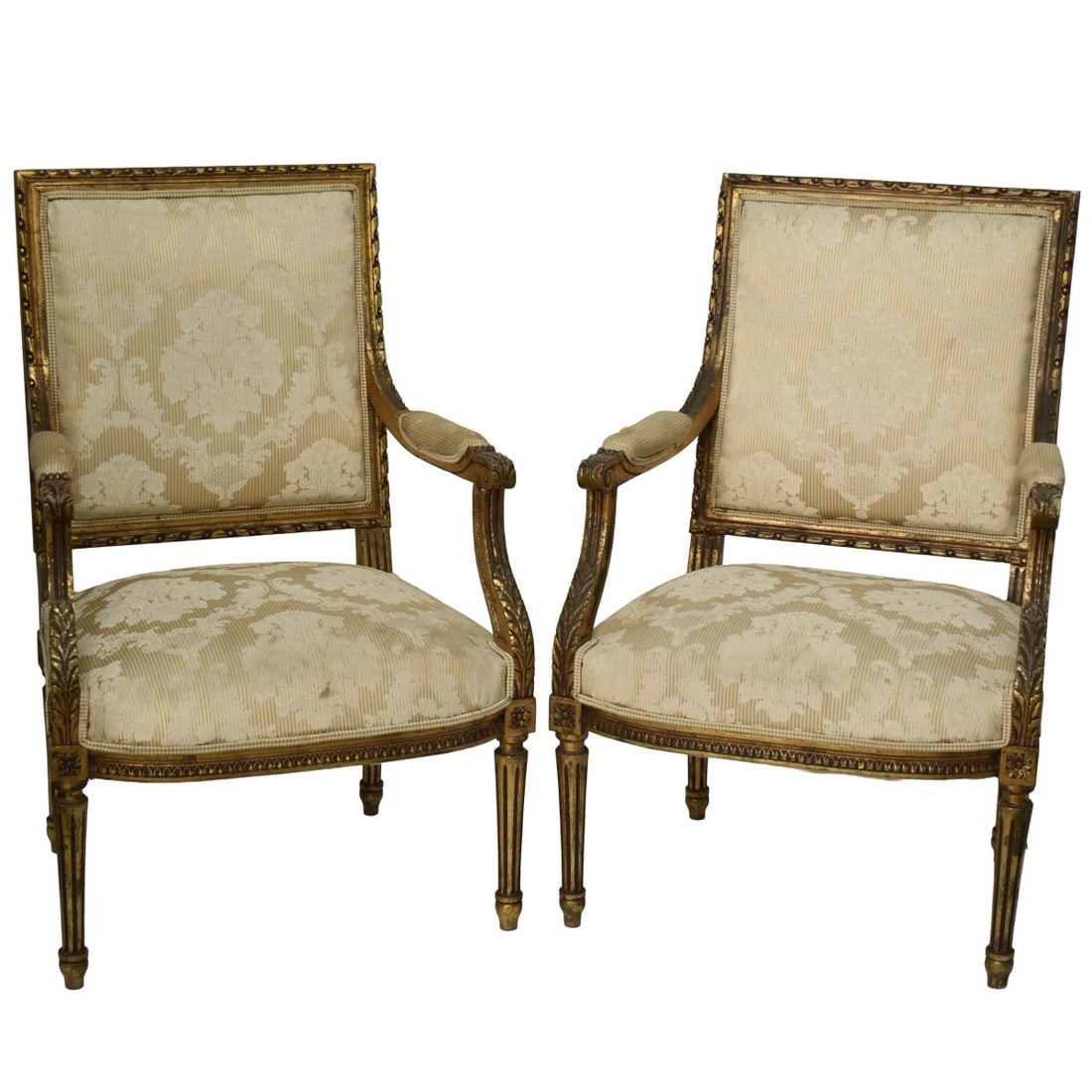 Lois XVI Style French Giltwood Chairs: Fine Pair of Louis XVI Style French Damask Upholstered Giltwood Arm Chairs. Measures: 38" high, 25" wide, 22" deep, seat 17" high. Provenance: From an Important Coconut Grove, Florida Estate. Kodner