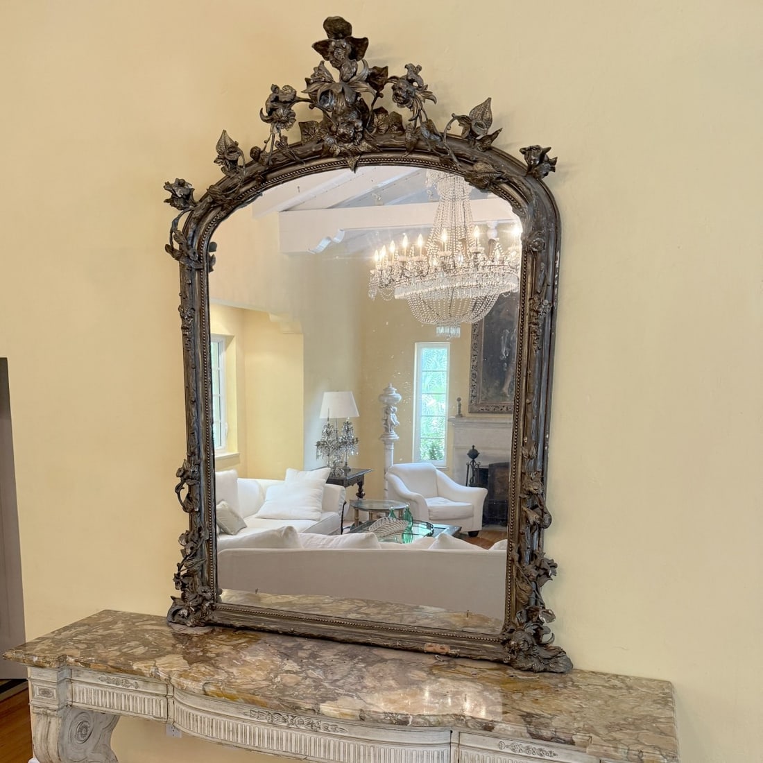 Palace Size French Mirror: Palace Size French Carved Wood Mirror with Multitude of Heavy Carved Flowers. Measures approximately: 80" high, 58" wide. Provenance: From an Important Coconut Grove, Florida Estate. Kodner Galleries