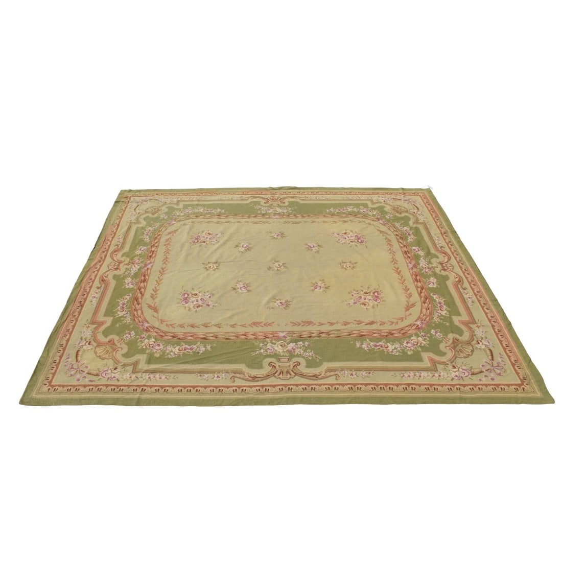French Aubusson Woven Carpet: Semi -antique French Flat-weave Wool Abusson Carpet with an Overall Green, Rose and Buff Floral Pattern. Measures: 122" x 97". Kodner Galleries offers phone and absentee bidding at a low, flat 21%