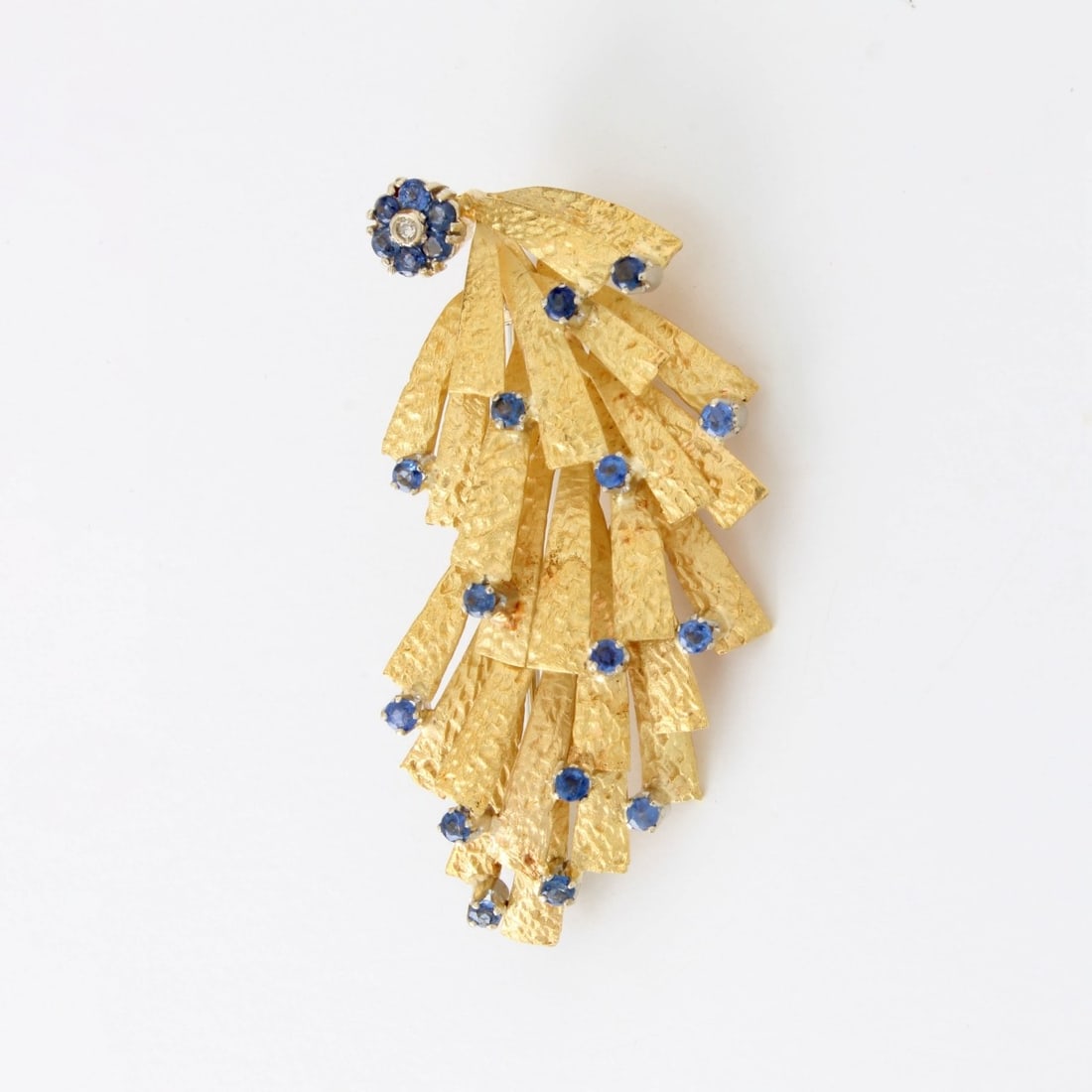Sapphire, Diamond and 18K Brooch: Vintage Italian Approx. 1.0 Carat TW Round Cut Sapphire, a Single Cut Diamond and 18 Karat Yellow Gold Spray Brooch. Stamped Italy 18K. Measures 2" L. Approx. weight: 11.6 grams. Kodner Galleries