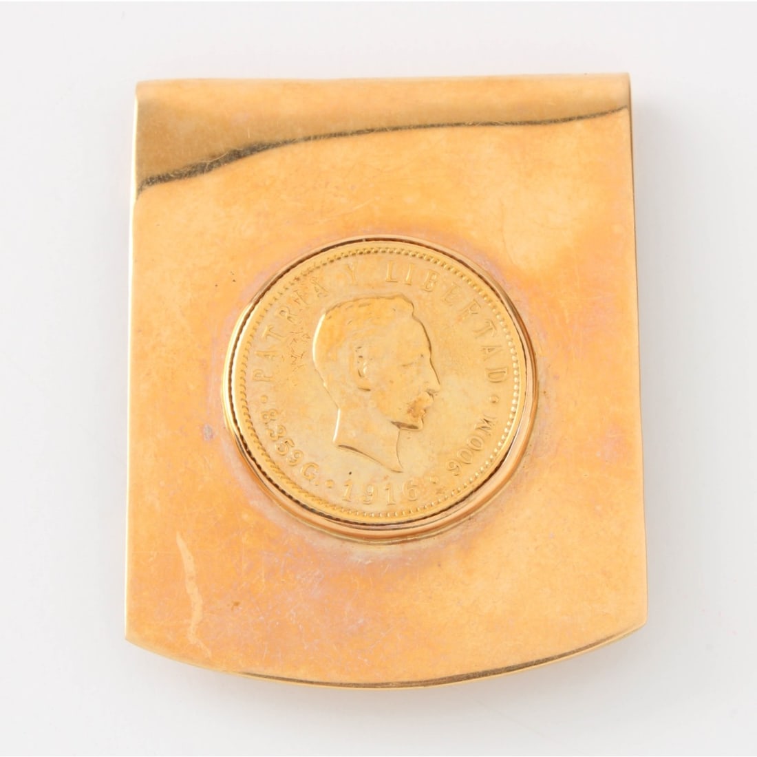 Gold Coin and 14K Money Clip: Vintage Gold Coin and 14 Karat Yellow Gold Money Clip. Measures 1-1/2" x 1-1/4". Approx. weight: 23.1 grams. Kodner Galleries offers phone and absentee bidding at a low, flat 21% buyer?s premium