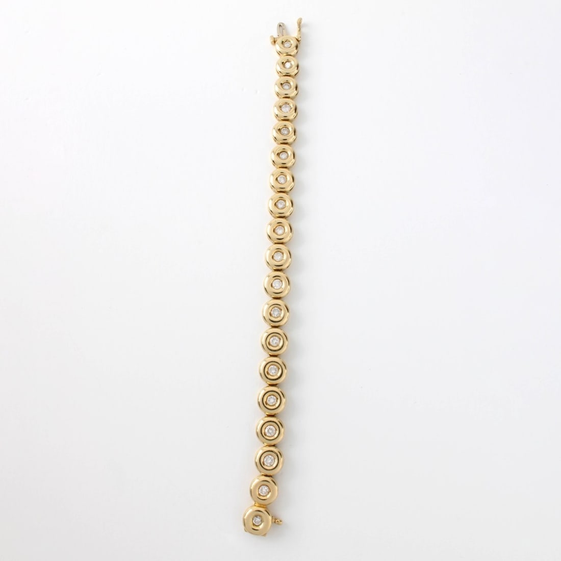 Diamond and 14K Link Bracelet: Approx. 2.25 Carat TW Nineteen Round Brilliant Cut Diamond and 14 Karat Yellow Gold Link Bracelet. Diamonds G-H color, VS-SI clarity. Stamped 14K, Measures 6-1/2" L. Approx. weight: 19.42 grams.
