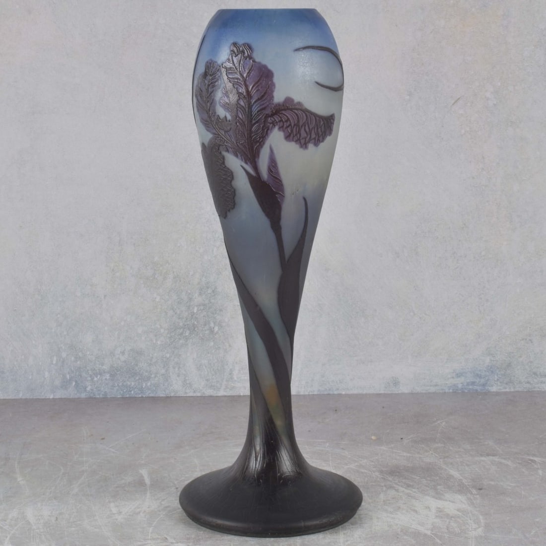 Galle French Cameo Glass Vase: Emile Galle French Cameo Glass Iris Footed Vase Circa 1920. Signed "Galle" to the side of the foot. Measures: 14-1/2" high, foot measures: 5-1/4" diameter. Kodner Galleries offers phone and absentee