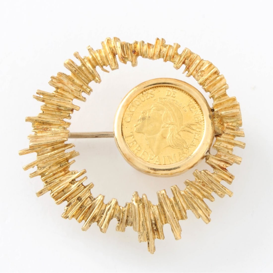 Gold Coin and 18K Pin: Vintage Venezuela Terepaima Gold 5 Bolivares Caciques Indian Chiefs Head Gold Coin and 18 Karat Yellow Gold Pin. Measures 1-1/4" diam. Approx. total weight: 8.63 grams. Kodner Galleries offers phone