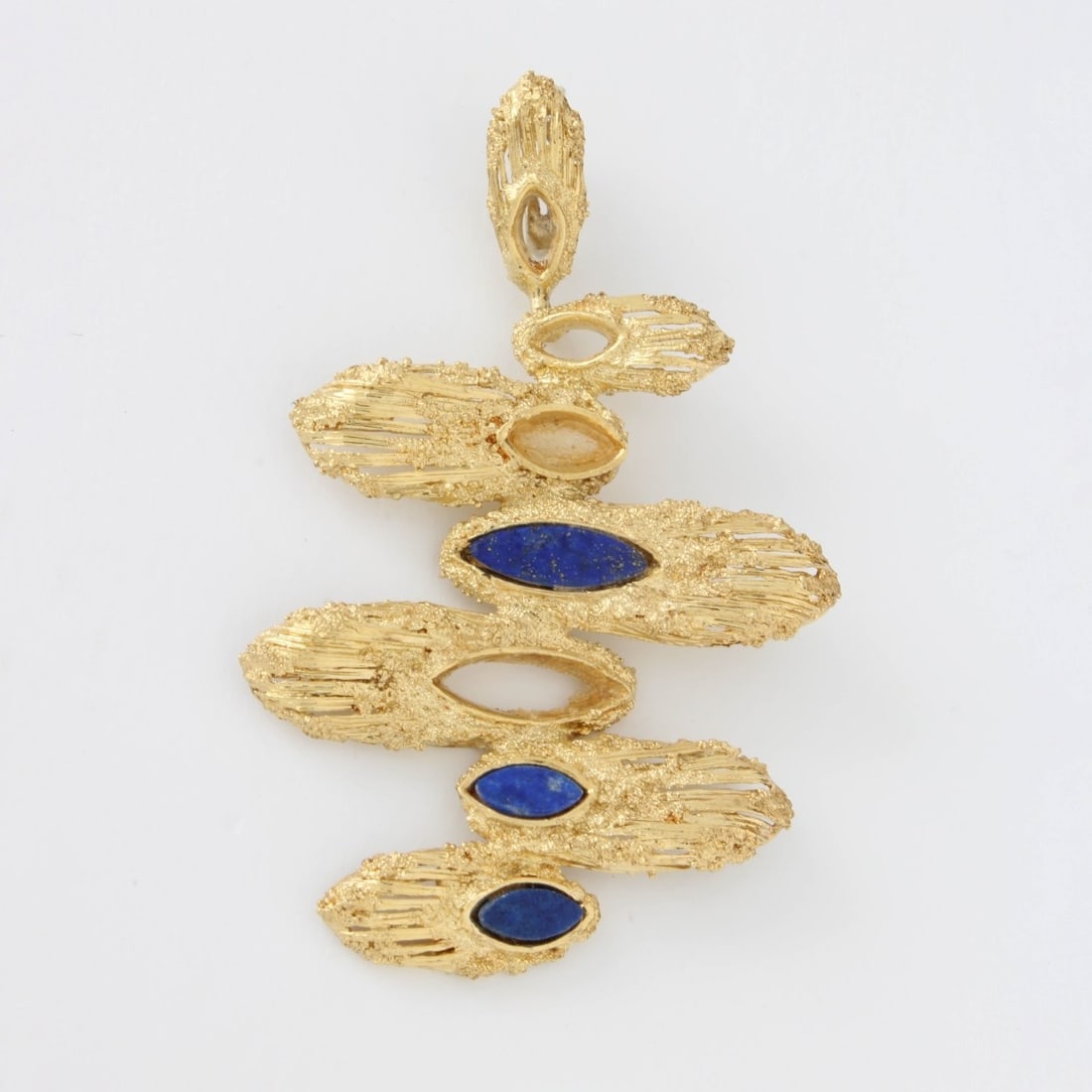 Retro 18K and Lapis Pendant: Vintage Retro Design 18 Karat Yellow Gold and Marquise Shape Lapis Lazuli Pendant. Measures 2" W. Approx. weight: 7.95 grams. Kodner Galleries offers phone and absentee bidding at a low, flat 21%