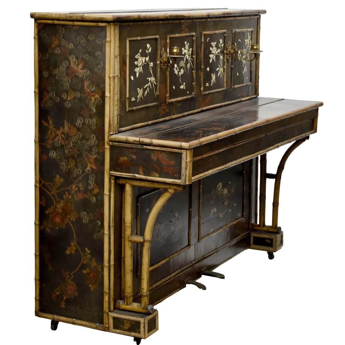 19th C. English Chinoiserie Piano: Late 19th Century Victorian English Chinoiserie Upright Piano with Two (2) Brass Candle Sconces. Decorated with flowers and small sparrows. Measures: 47-1/2" high, 56" wide, 26" deep. We Will Not