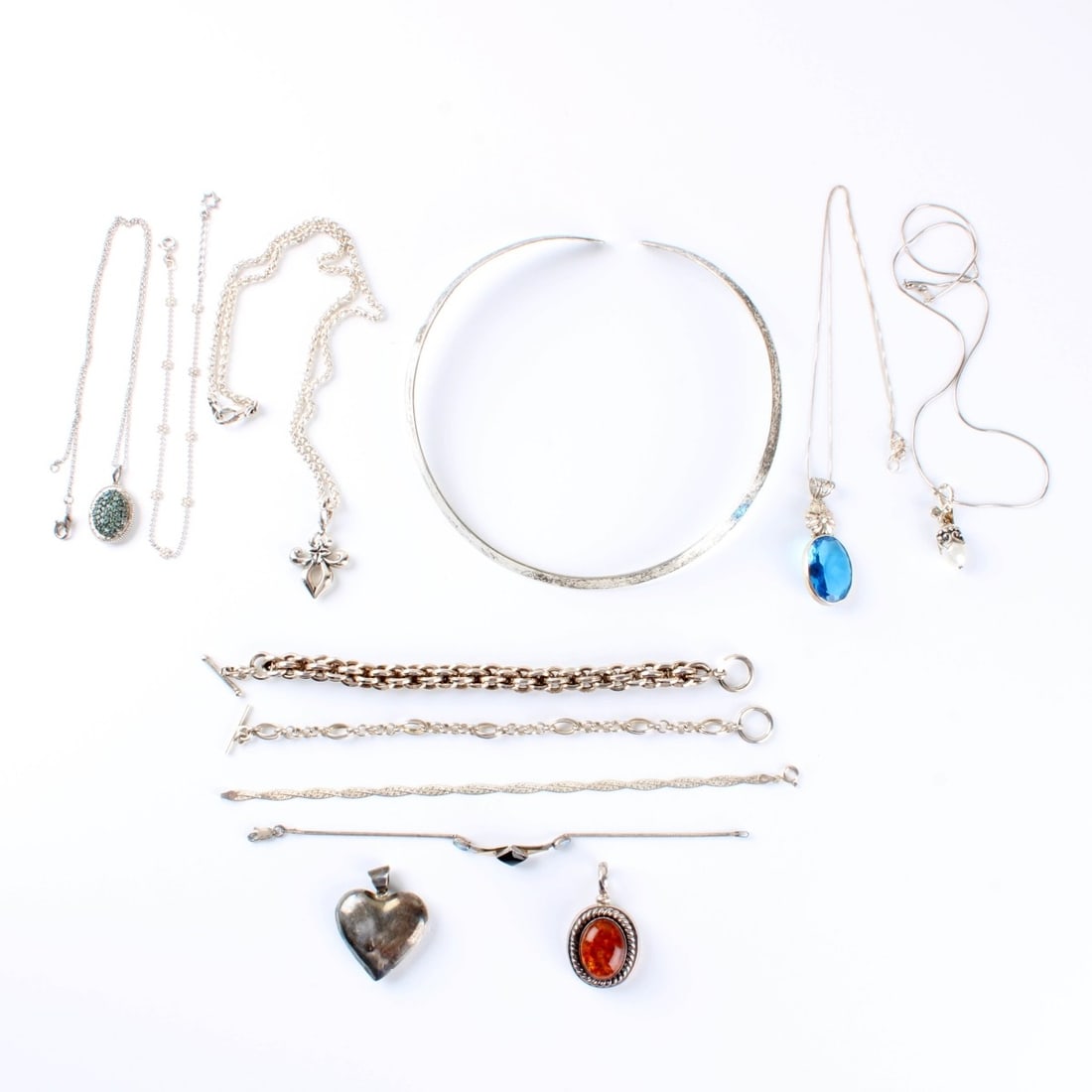 Sterling Jewelry: Assorted Sterling Silver Jewelry. To include necklaces, bracelets and pendant. Variously accented with color stones, pearl amber and hardstone. Approx. total weight: 158.15 grams. Condition: Good cond