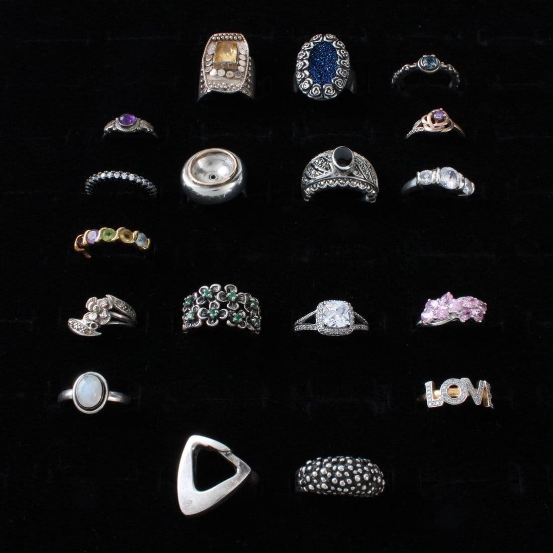 Sterling Rings: Collection of Sixteen (16) Vintage Sterling Silver Rings. Variously accented with color stones, faux diamonds, and hardstones.. Rings sizes 3 to 8. Approx. total weight: 89.74 grams. Condition: Good