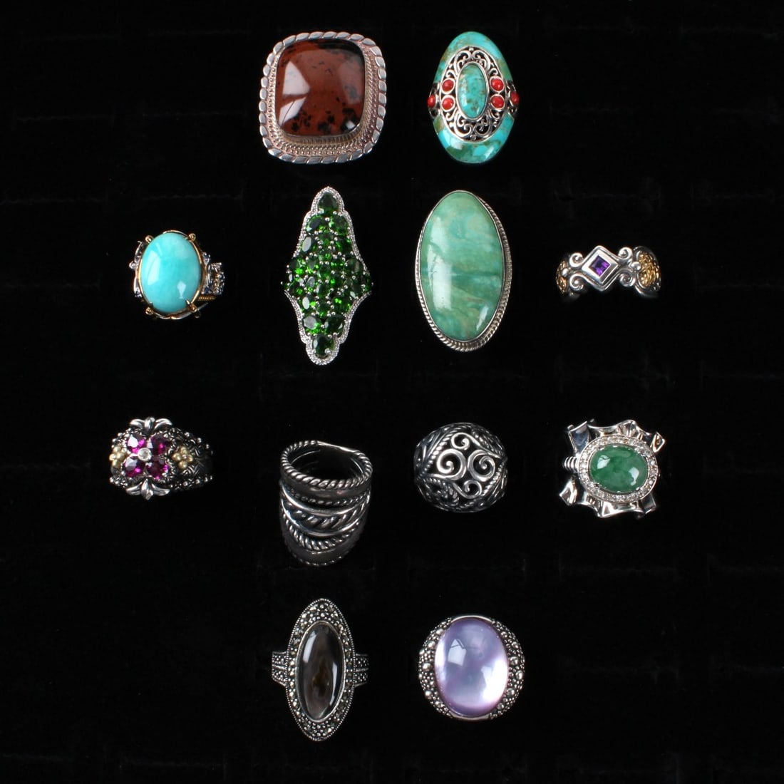 Sterling Rings: Collection of Twelve (12) Vintage Sterling Silver Rings. Variously accented with color stones, faux diamonds and hardstones.. Rings sizes 5 to 8-3/4. Approx. total weight: 148.39 grams. Condition: