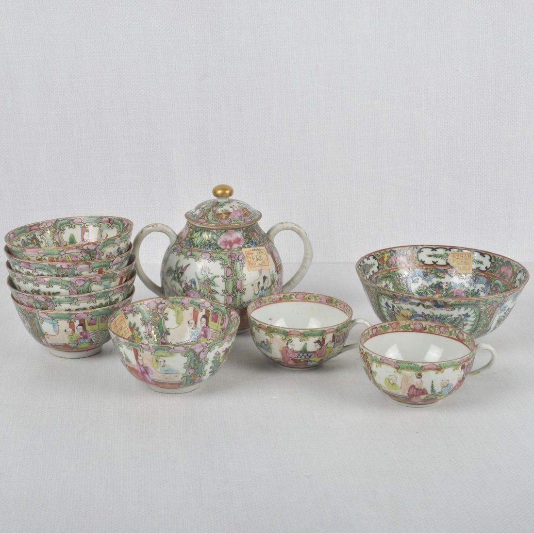 Chinese Famille Rose Medallion Pieces: Ten (10) Chinese Famille Rose Medallion Porcelain Pieces with Wax Seals to the bottoms. Consisting of 1 two handle teapot, measures: 5-1/2" high, 1 bowl, measures: 2-1/2" high, 6-1/4" diameter, 6