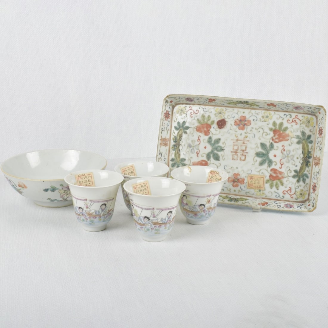 Chinese Porcelain Pieces: Chinese Porcelain Pieces some with Wax Seals to the Pieces. Consisting of: 1 tray, measures: 1" high, 10" long, 6-1/2" deep, 4 cups, measures: 2-3/4" high, 3-1/8" diameter. Kodner Galleries offers pho