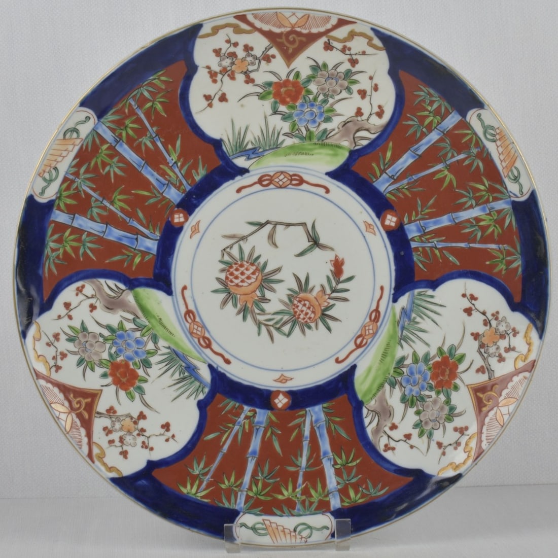 Japanese Imari Platter: 20th Century Japanese Porcelain Hand Painted Imari Platter. Measures: 2" high, 18" diameter. Kodner Galleries offers phone and absentee bidding at a low, flat 21% buyer?s premium without surcharge or