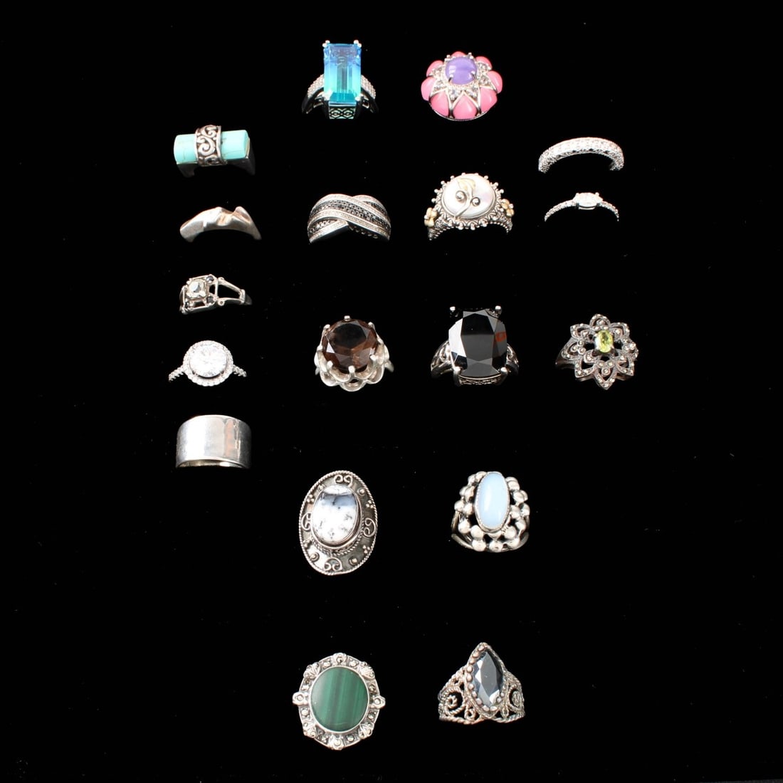 Sterling Rings: Collection of Eighteen (18) Vintage Sterling Silver Rings. Variously accented with color stones, hardstones and faux diamonds. Rings sizes 5 to 7. Approx. total weight: 111.42 grams. Kodner Galleries