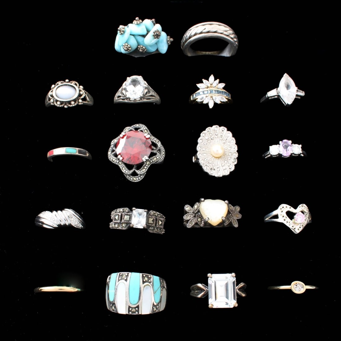 Sterling Rings: Collection of Eighteen (18) Vintage Sterling Silver Rings. Variously accented with color stones, pearl, hardstones and faux diamonds. Rings sizes 6 to 9-3/4. Approx. total weight: 85.85 grams. Kodner