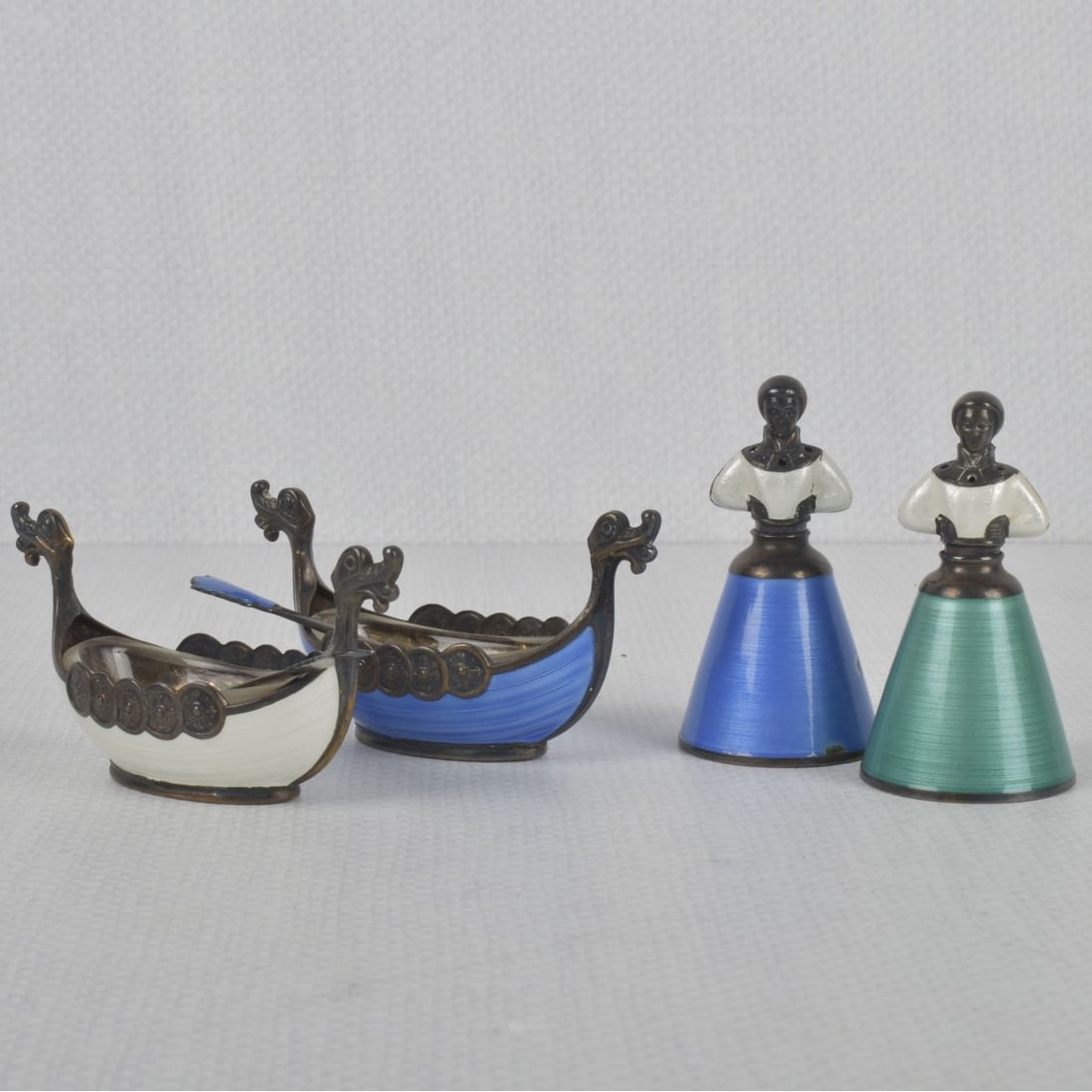 J. Tostrup Norway Sterling Silver: J. Tostrup Norway Sterling Silver and Enamel Table Ware Pieces. Late 20th century. All pieces properly marked to undersides. Consisting of a pair of salt & pepper shakers modeled as female figures