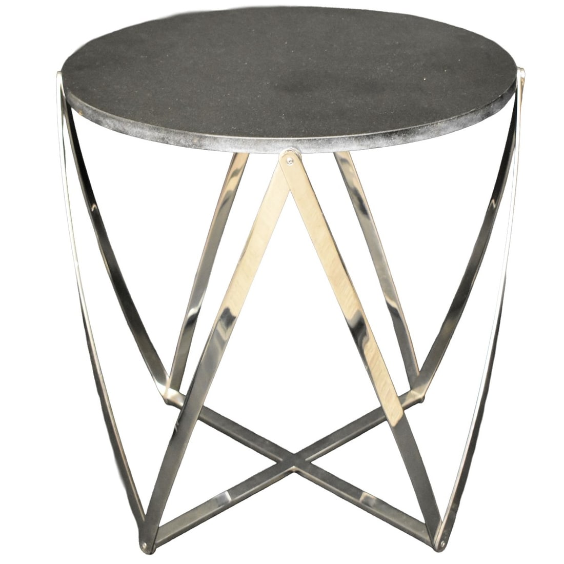 John Vesey Table: John Vesey Polished Heavy Aluminum Side Table with Spool Supports and a Black Granite Top. Measures: 25" high, 24-1/2" diameter. Kodner Galleries offers phone and absentee bidding at a low, flat 21%