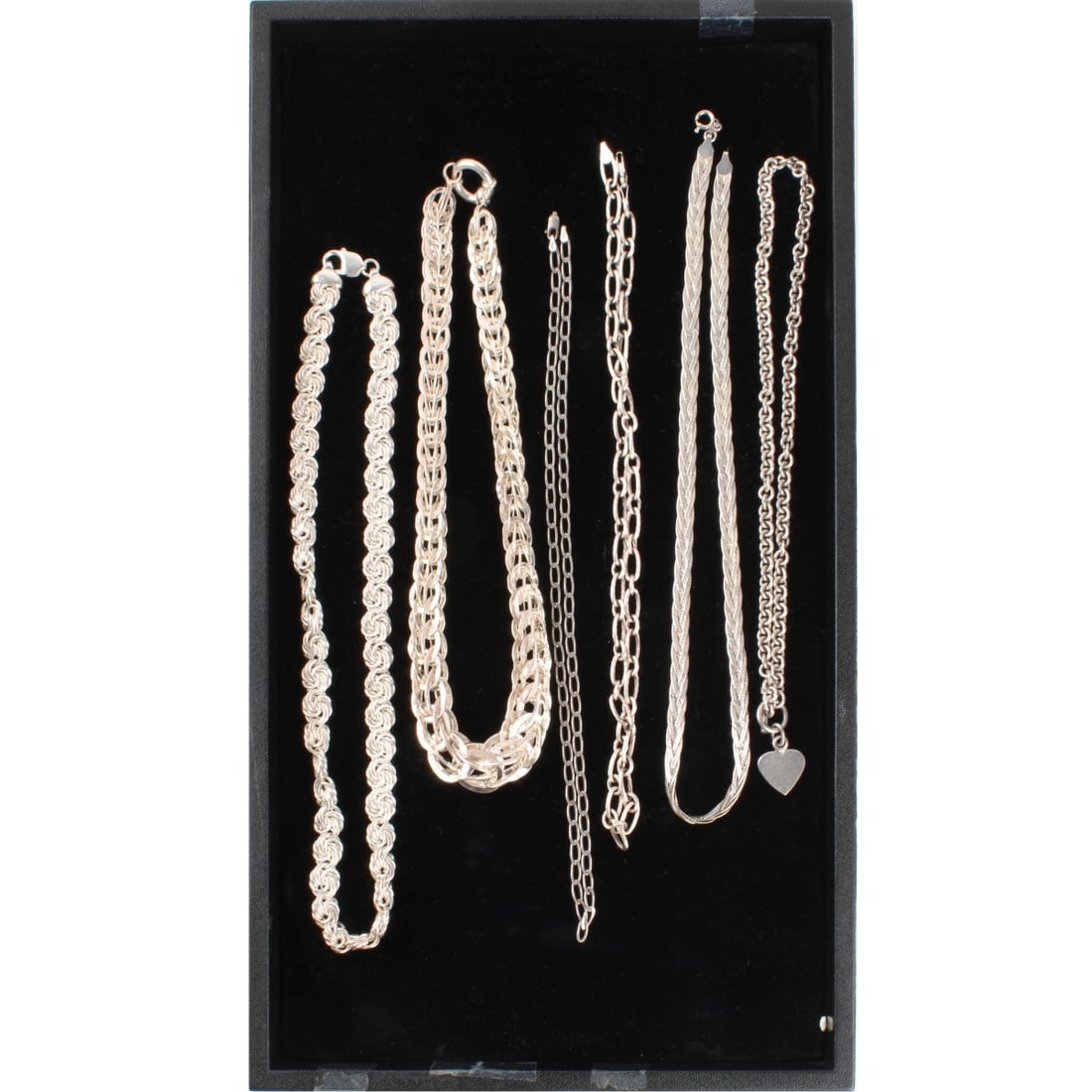 Sterling Necklaces / Chains: Six (6) Sterling Silver Necklaces / Chains. Largest measures 17-1/2" L, 3/4" W. One stamped Tiffany & Co. Approx. total weight: 172.10 grams. Kodner Galleries offers phone and absentee bidding at a