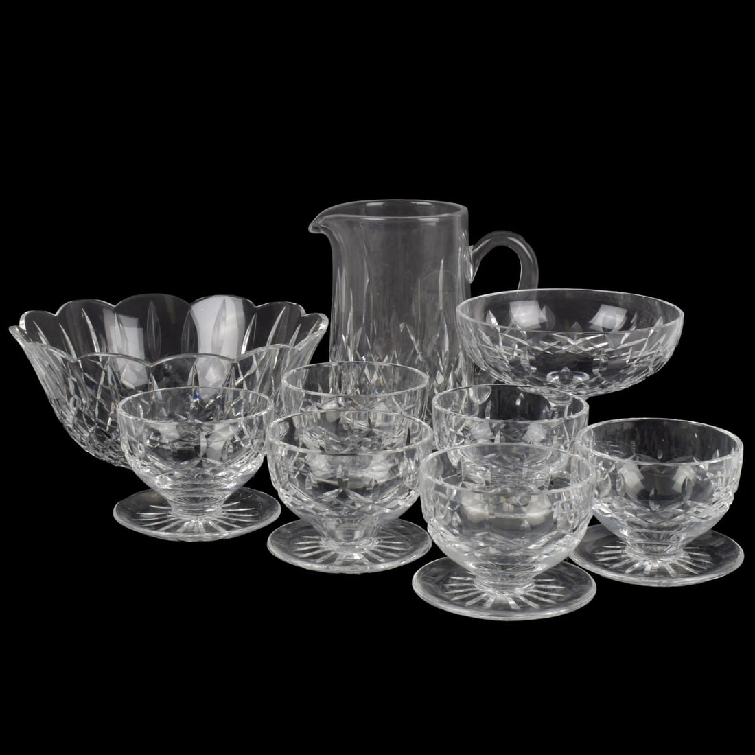Waterford Cut Crystal: Nine (9) Pieces Waterford Lismore Cut Crystal. Consisting of: Six (6) desert bowls with attached under plates, measures: 3" high, 4-1/4" diameter, one (1) large scalloped edge bowl, measures: 4" high,