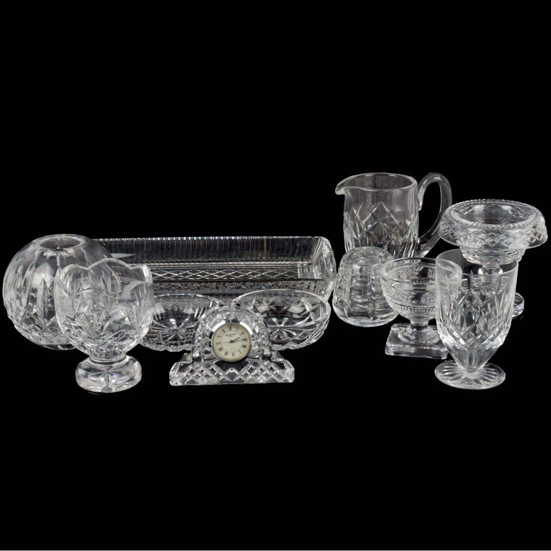Waterford Cut Crystal: Lot of Eleven (11) Waterford Cut Crystal Pieces. Including rectangular tray, measures: 1-1/4" high, 10-3/4" wide, 5-1/2" deep. one (1) turnover bowl,3-1/2" high, one (1) small clock, measures: 2-5/8" 
