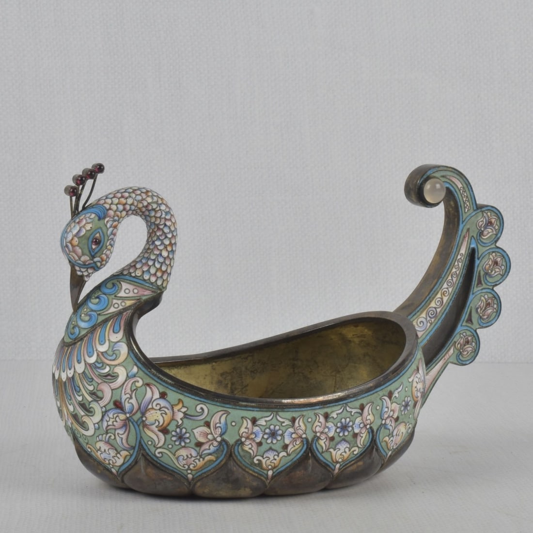Russian 84 Silver and Cloisonne Kovsh: Russian 84 Silver Gilt and Cloisonne Enamel Kovsh. Circa 1908-1917. Marked "KHLEBNIKOV" as well as "84" with warrant to the bottom. Measures: 6" high, 9" wide, 5" deep. Total weight: 21.68 troy ounces