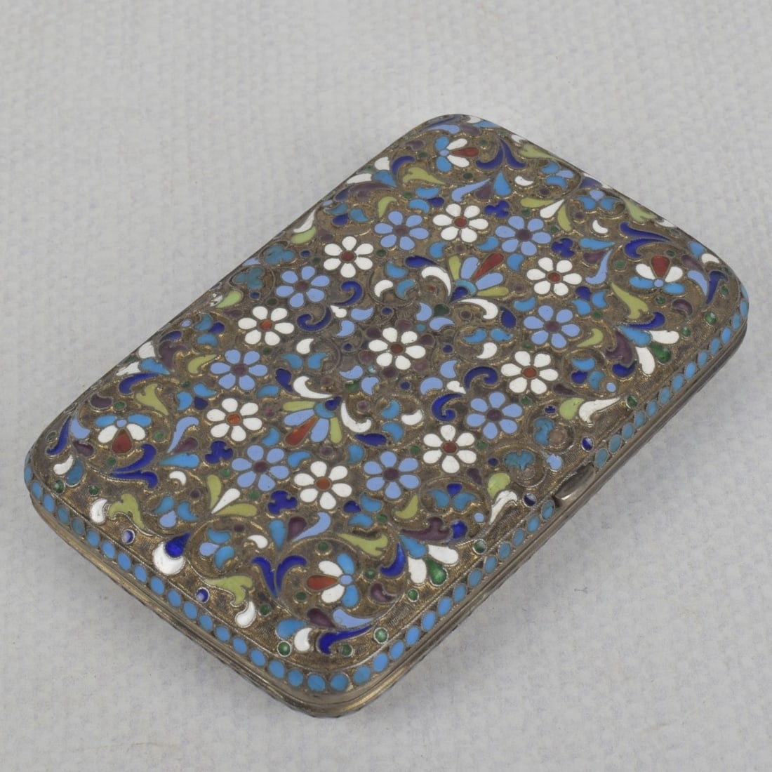 Russian 88 Silver Gilt and Cloisonne Enamel Cup: Russian 88 Silver Gilt and Cloisonne Enamel Cigarette Case with Gold Wash. Circa 1900. Marked with initials for Sergey Shaposhnikov as well as "88". Measures: 3/4" high, 3-3/4" wide, 2-3/8" deep. Tota