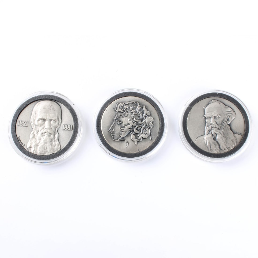 Giants of Russian Literature Silver Medallions: Giants of Russian Literature Silver Medallions. Elegant wooden boxed set of three silver medallions minted at Leningrad in the USSR in 1975. Measures 1-1/2" diameter and contains one troy ounce of