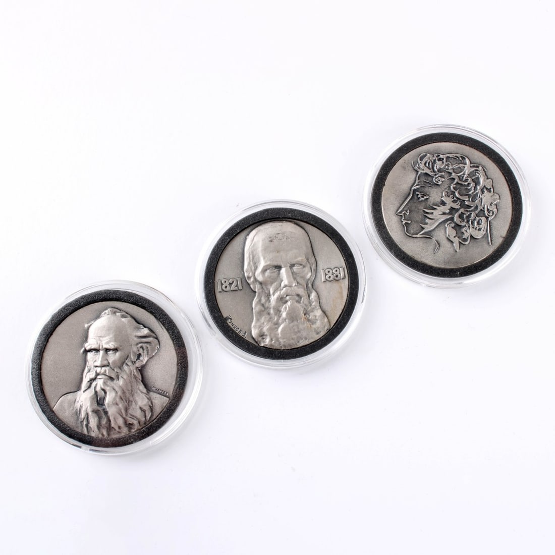 Giants of Russian Literature Silver Medallions: Giants of Russian Literature Silver Medallions. Elegant wooden boxed set of three silver medallions minted at Leningrad in the USSR in 1975. Measures 1-1/2" diameter and contains one troy ounce of
