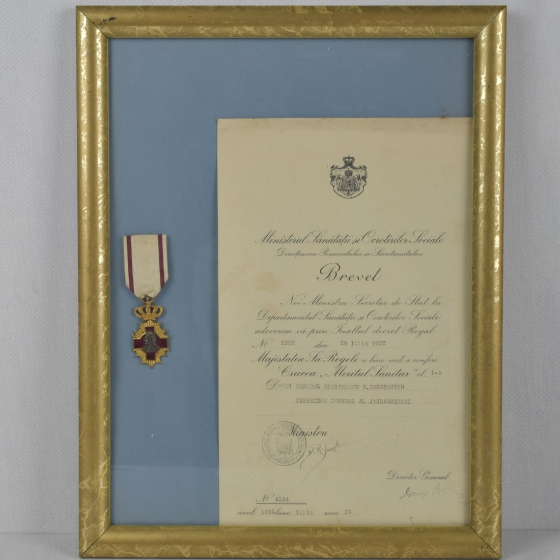 Romania Cross for Medical Merit: Romania Cross for Medical Merit 1st Class with Crown Suspension. Framed Under Glass Personal Award Dated 1932. Kodner Galleries offers phone and absentee bidding at a low, flat 21% buyer?s premium wit