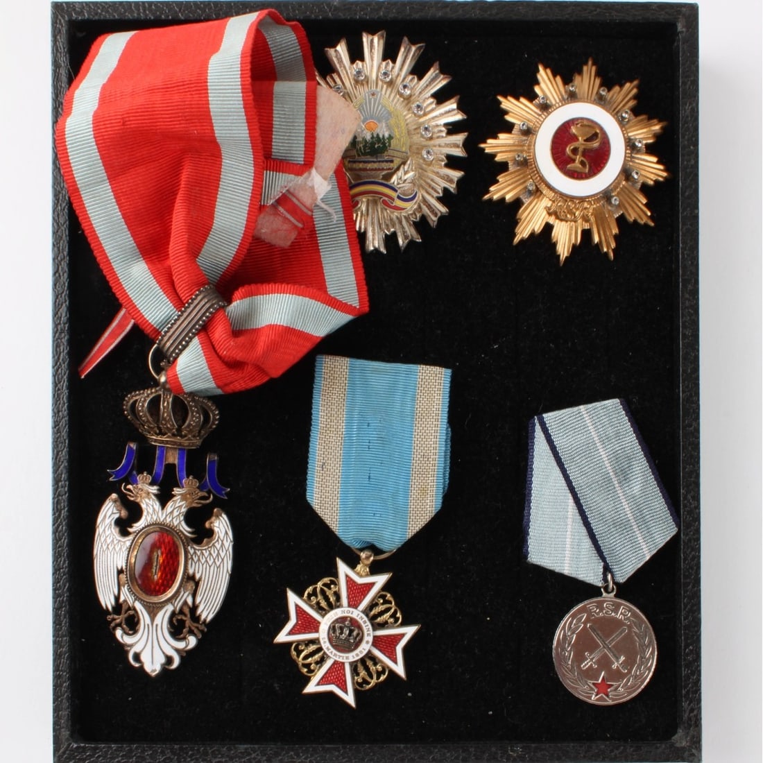 Vintage War Medals and Decorations: Five (5) Vintage War Medals and Decorations. 1. Serbian Order of the White Eagle Medal 1882 in blue and white enamel with double headed eagle and a crown suspension having a silk grosgrain ribbon. 2. 