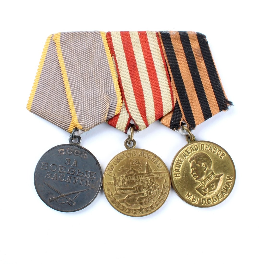 Vintage War Medals and Decorations: Vintage War Medals and Decorations. Russian Group of Three (3) War Medals. Military Merit, Medal for the Defense of Moscow and Medal for the Victory over Germany. All with silk grosgrain ribbons. Kodn