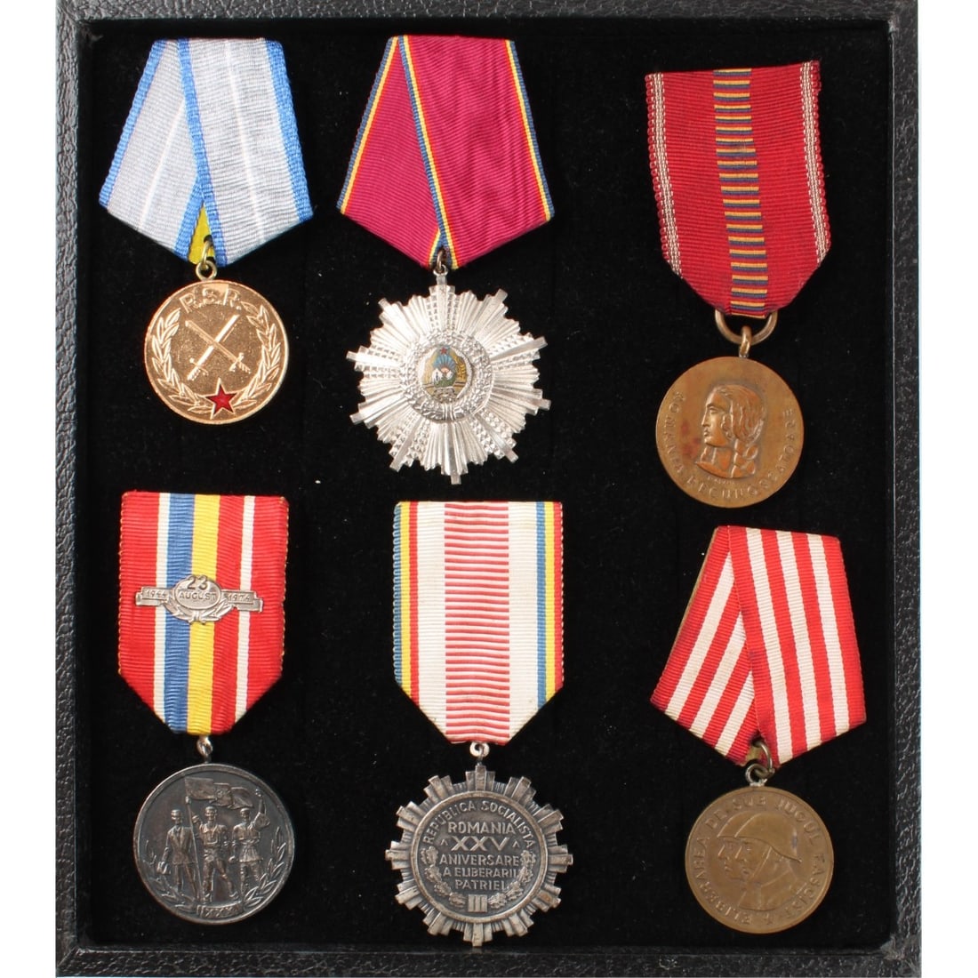 Vintage Romanian War Medals and Decorations: Six (6) Romanian War Medals and Decorations with Silk Grosgrain Ribbons. 1. Merit Medal 2nd Class Issued 1965-18989. 2. 25th Anniversary of the Republic of Romania. 3. Liberation from the Fascist Yoke