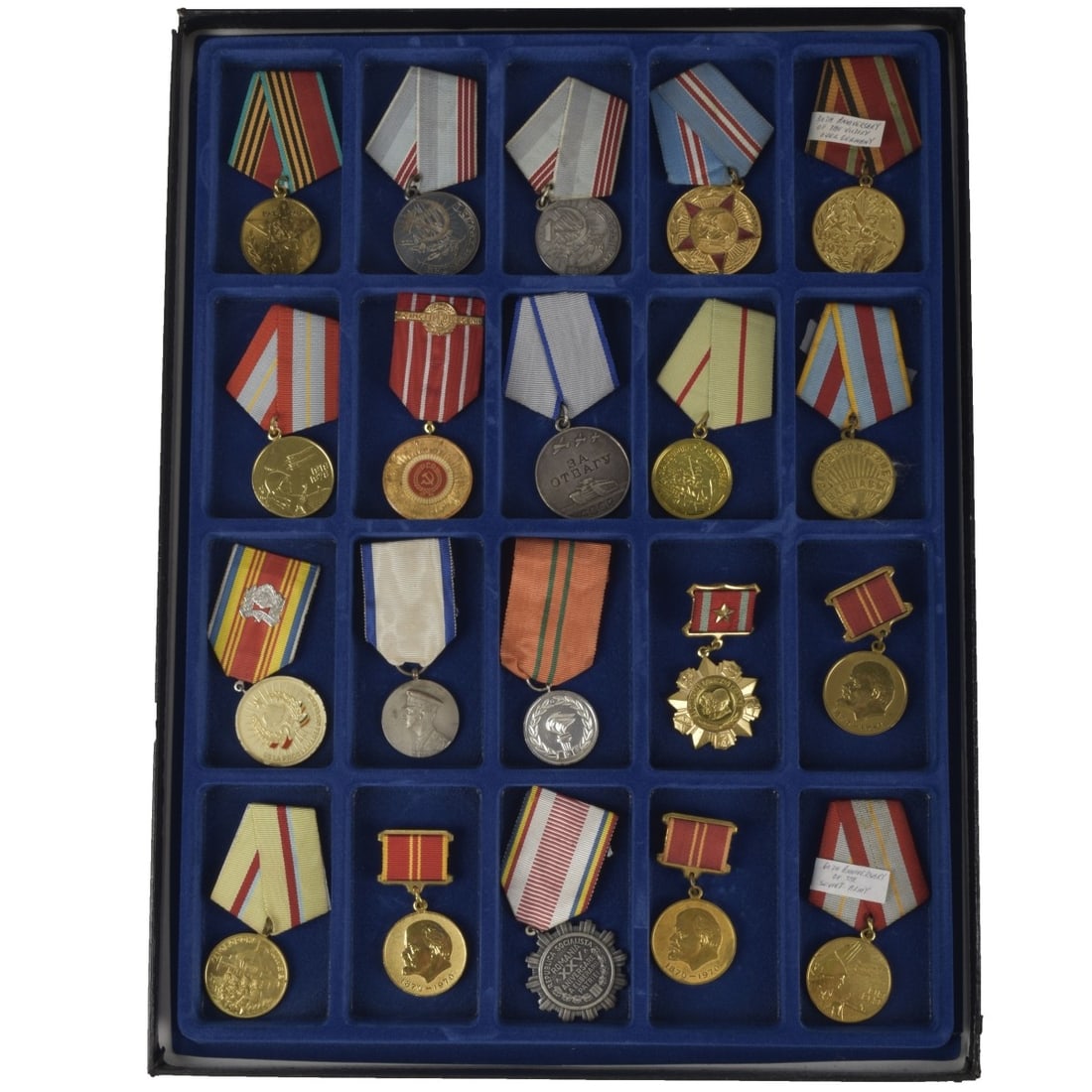 Russian and Bulgaria Medals and Badges: Collection of Twenty (20) Russian and Bulgaria Medals and Badges. Various campaigns and years. Some with Grosgrain ribbons. Kodner Galleries offers phone and absentee bidding at a low, flat 21% buyer?