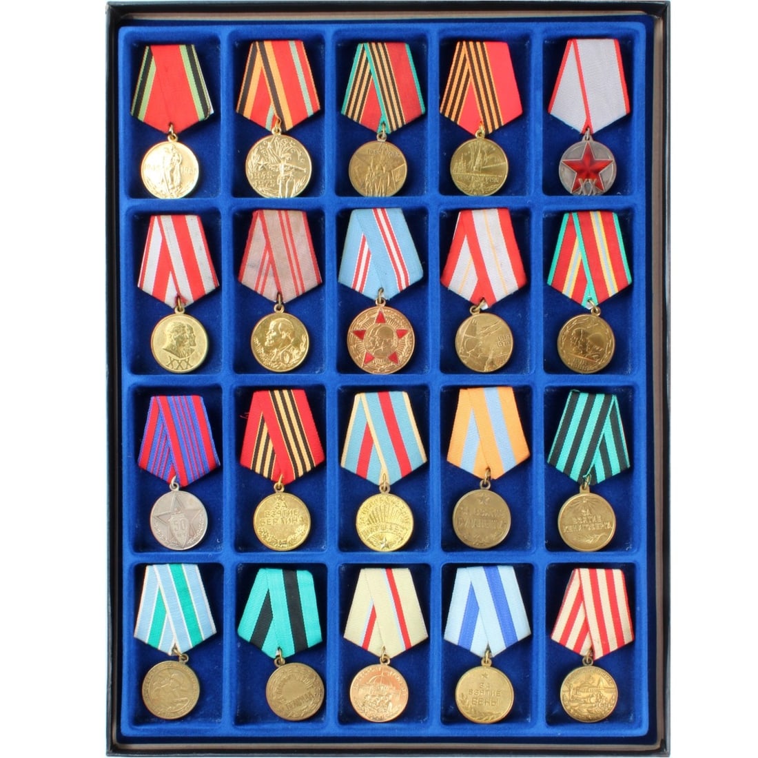 Russian and Bulgaria Medals and Badges: Collection of Twenty (20) Russian and Bulgaria Medals and Badges. Various campaigns and years. Some with Grosgrain ribbons. Kodner Galleries offers phone and absentee bidding at a low, flat 21% buyer?