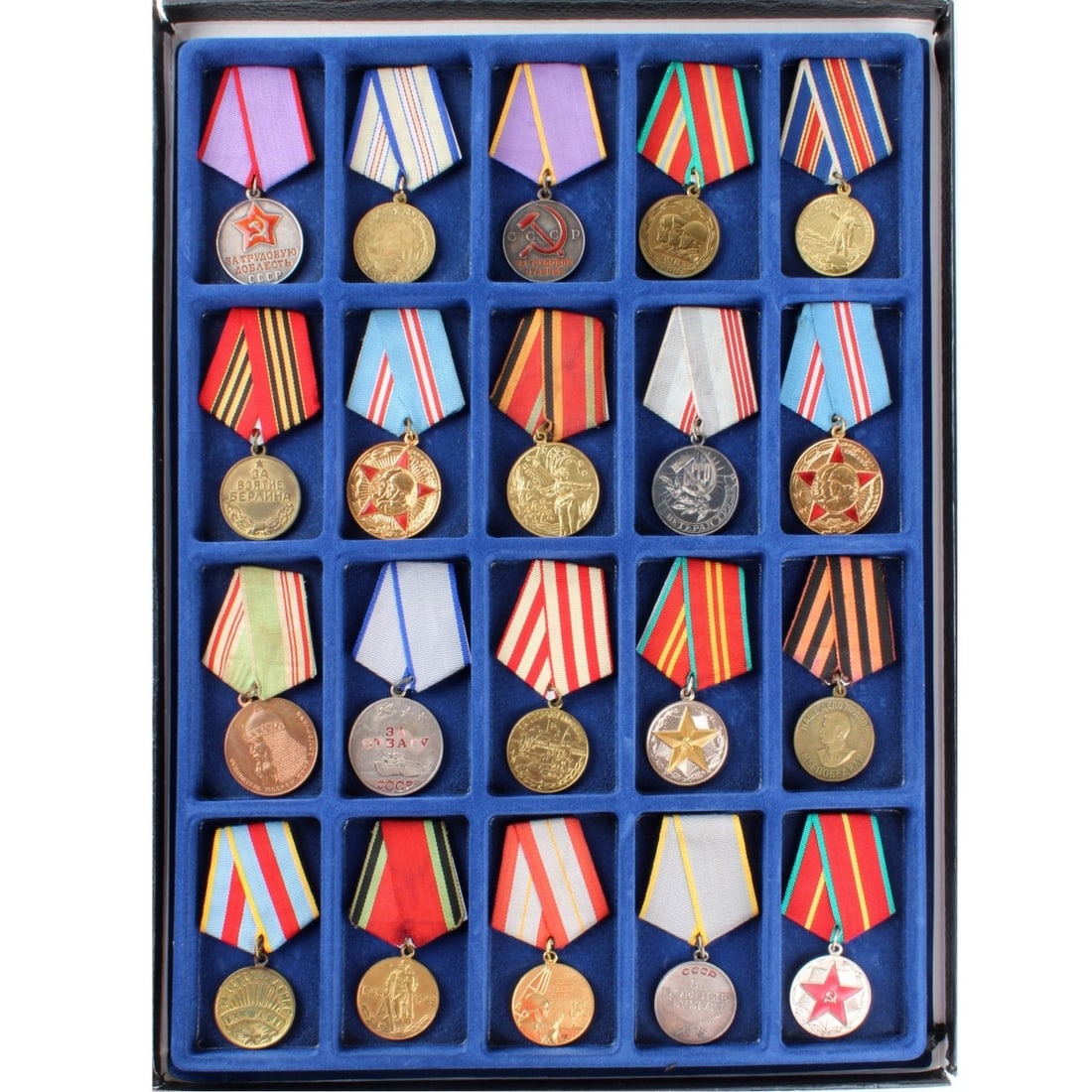 Russian and Bulgaria Medals and Badges: Collection of Twenty (20) Russian and Bulgaria Medals and Badges. Various campaigns and years. Some with Grosgrain ribbons. Kodner Galleries offers phone and absentee bidding at a low, flat 21% buyer?