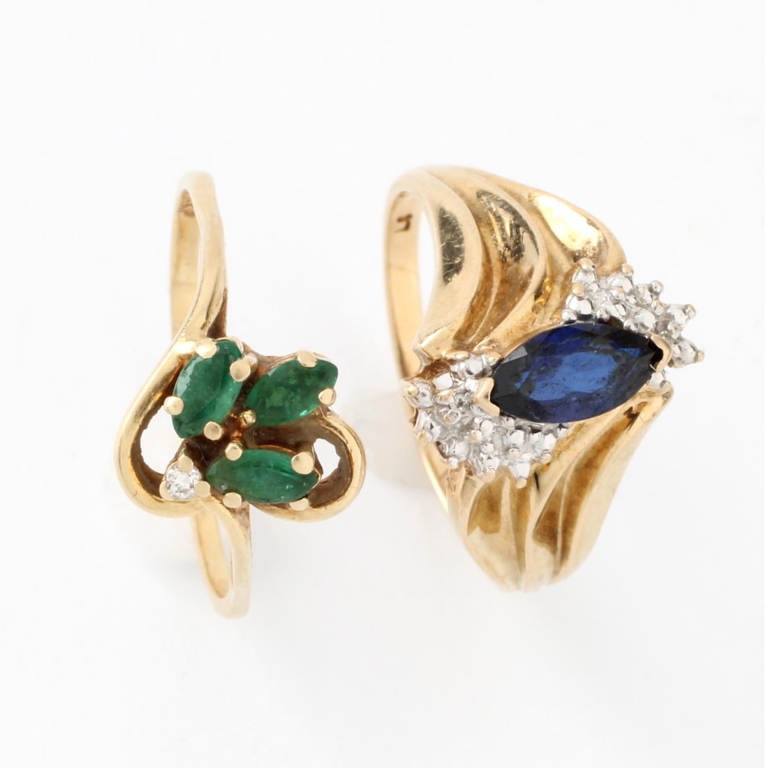 Gemstone and Gold Rings: Vintage Emerald, Diamond and 14 Karat Yellow Gold Ring together with Sapphire, Diamond and 10 Karat Yellow Gold Ring. Ring sizes 8 and 7. Approx. total weight: 5.53 grams. Kodner Galleries offers