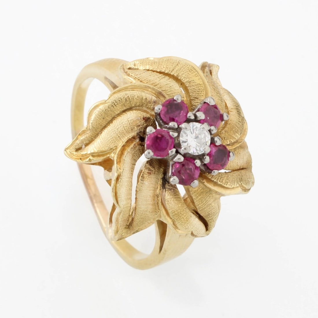 Ruby, Diamond and 18K Ring: Vintage Round Cut Ruby, Round Brilliant Cut Diamond and 18 Karat Yellow Gold Flower Ring. Rubies with vivid color. Diamond G-H color, VS2 clarity. Ring size 9-3/4. Stamped 18K. Approx. weight: 9.09 gr