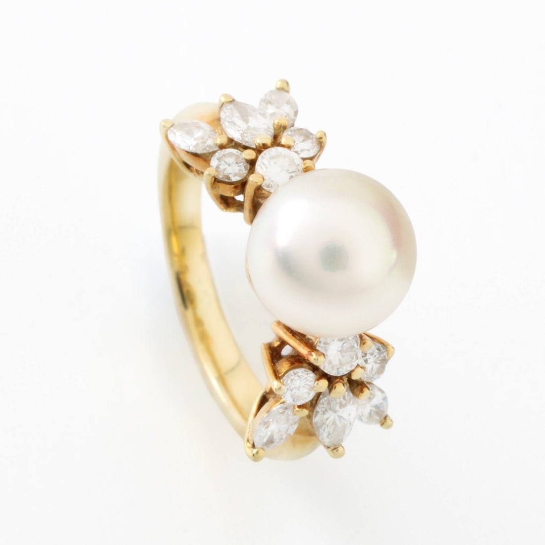 Mikimoto Pearl and Diamond Ring: Vintage 8.5mm Mikimoto Pearl, Marquise and Round Brilliant Cut Diamond and 18 Karat Yellow Gold Ring. High quality pearl. Diamonds G-H color, VS-SI clarity. Ring size 5. Approx. weight: 6.59 grams.