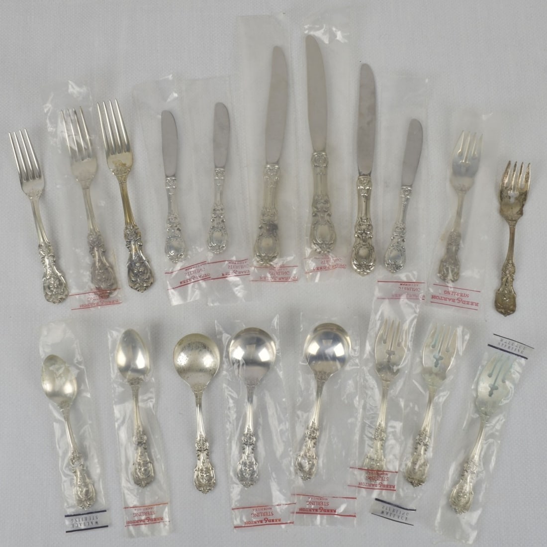 Reed & Barton Sterling Flatware: Nineteen (19) Pieces Reed and Barton Francois I Sterling Flatware. Consisting of 3 dinner forks, measures: 7-7/8" long, 5 salad forks, measures: 6-1/8" long, 2 dinner knives, measures: 9-1/4" long, 1 