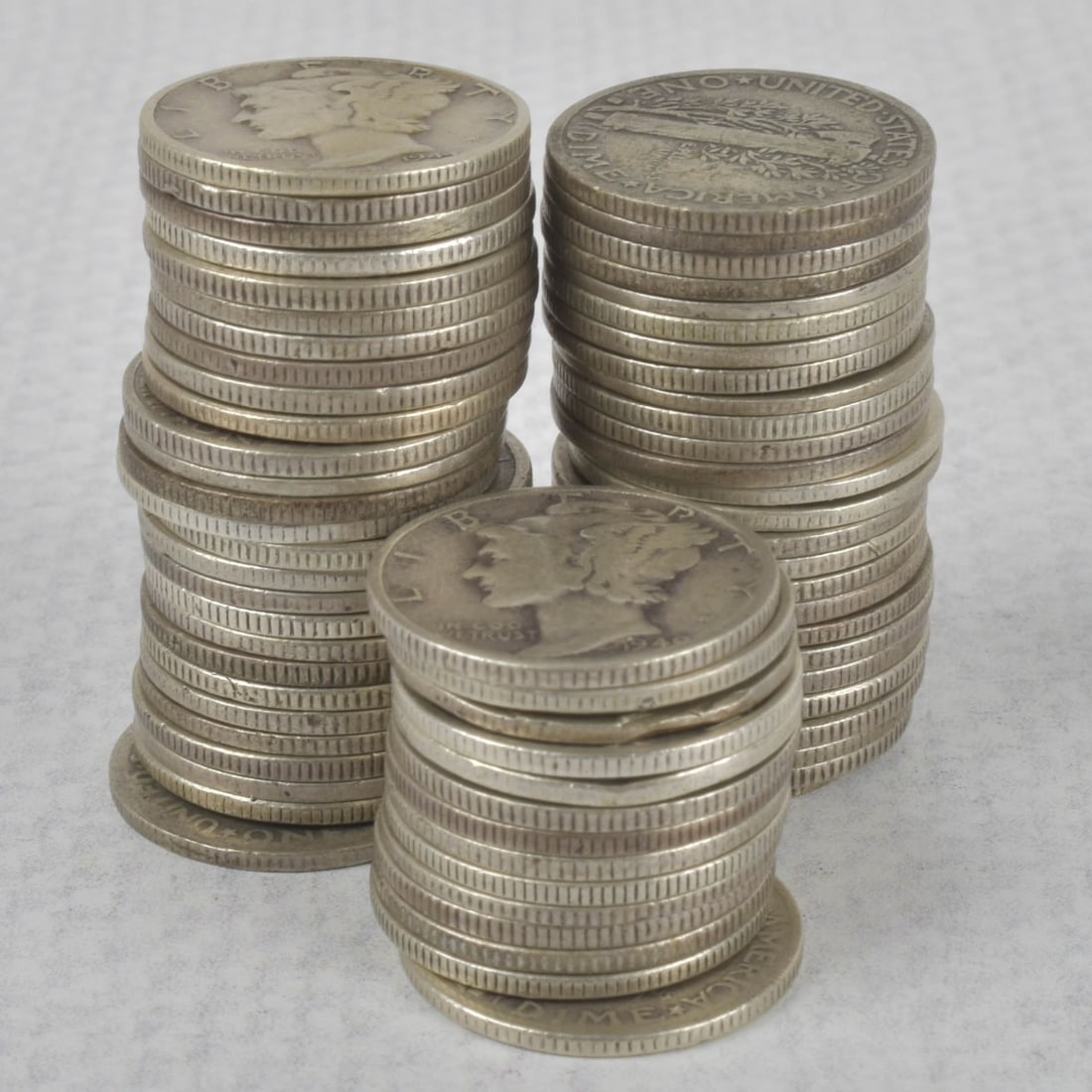 Liberty Head Liberty Dimes: Lot of Sixty-seven (67) 90% Silver Liberty Head Dimes. Circulated random dates. Total weight: 193.50 grams. Kodner Galleries offers phone and absentee bidding at a low, flat 21% buyer?s premium