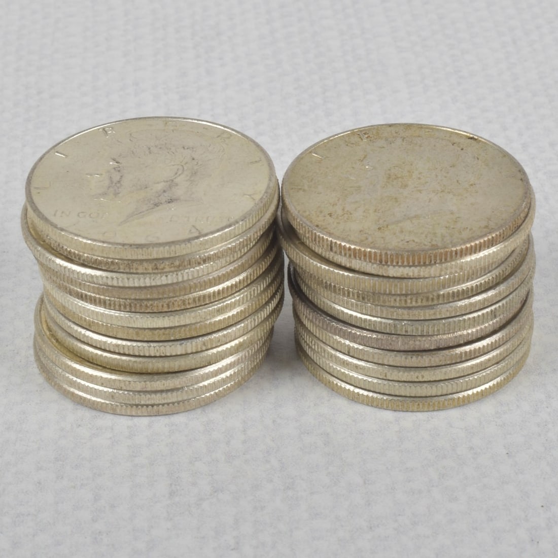 Kennedy Half-dollar Coins: Twenty-six (26) Kennedy Half-dollar Circulated Coins. All dated 1964. Total weight: 286.01 grams. Kodner Galleries offers phone and absentee bidding at a low, flat 21% buyer?s premium without