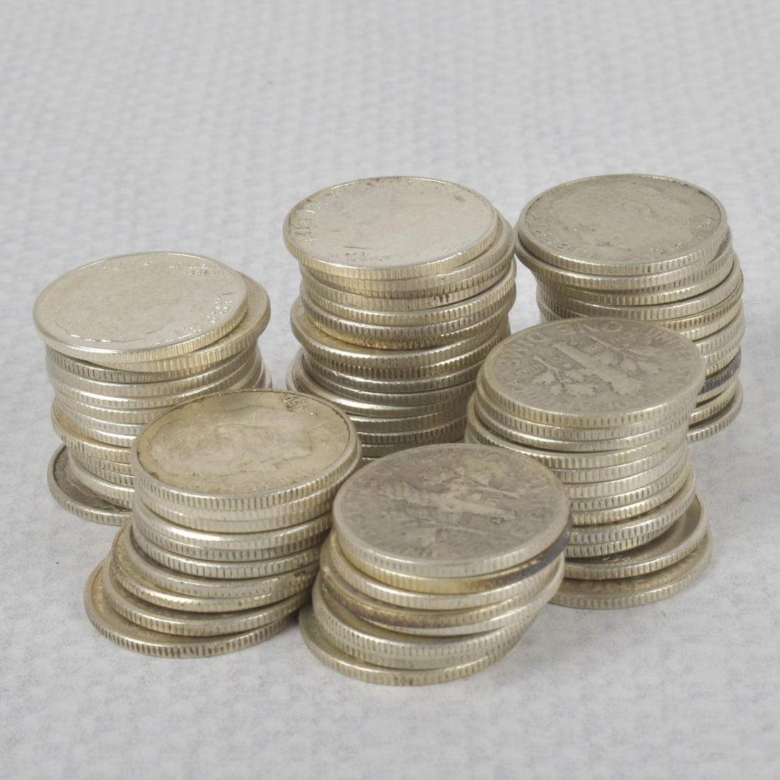 Roosevelt Liberty Dimes: Lot of Seventy-eight (78) 90% Silver Roosevelt Dimes. Circulated random dates. Total weight: 193.50 grams. Kodner Galleries offers phone and absentee bidding at a low, flat 21% buyer?s premium