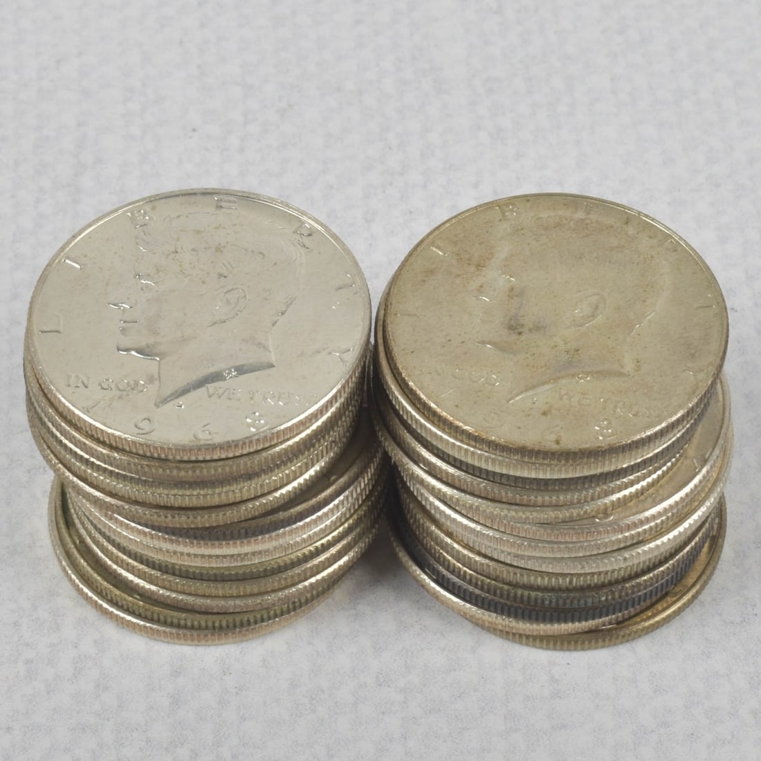 Kennedy Liberty Half-dollar Coins: Twenty-six (26) Kennedy Half-dollar Circulated Coins. Various years 1971-1978. Total weight: 302.01 grams. Kodner Galleries offers phone and absentee bidding at a low, flat 21% buyer?s premium without