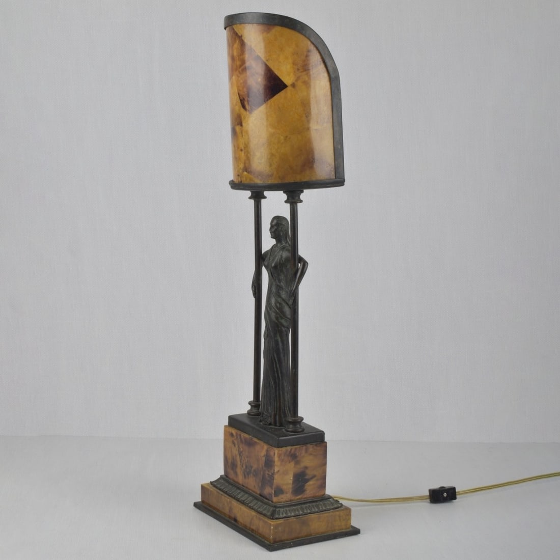Maitland Smith Art Deco Bronze Lamp: Vintage Maitland Smith Art Deco Bronze Female Table Lamp with a Decorative Mica Shade on a Stacked Faux Marble Rectangular Base. Original label to the bottom. Overall measures: 24-1/2" high, 7" wide,
