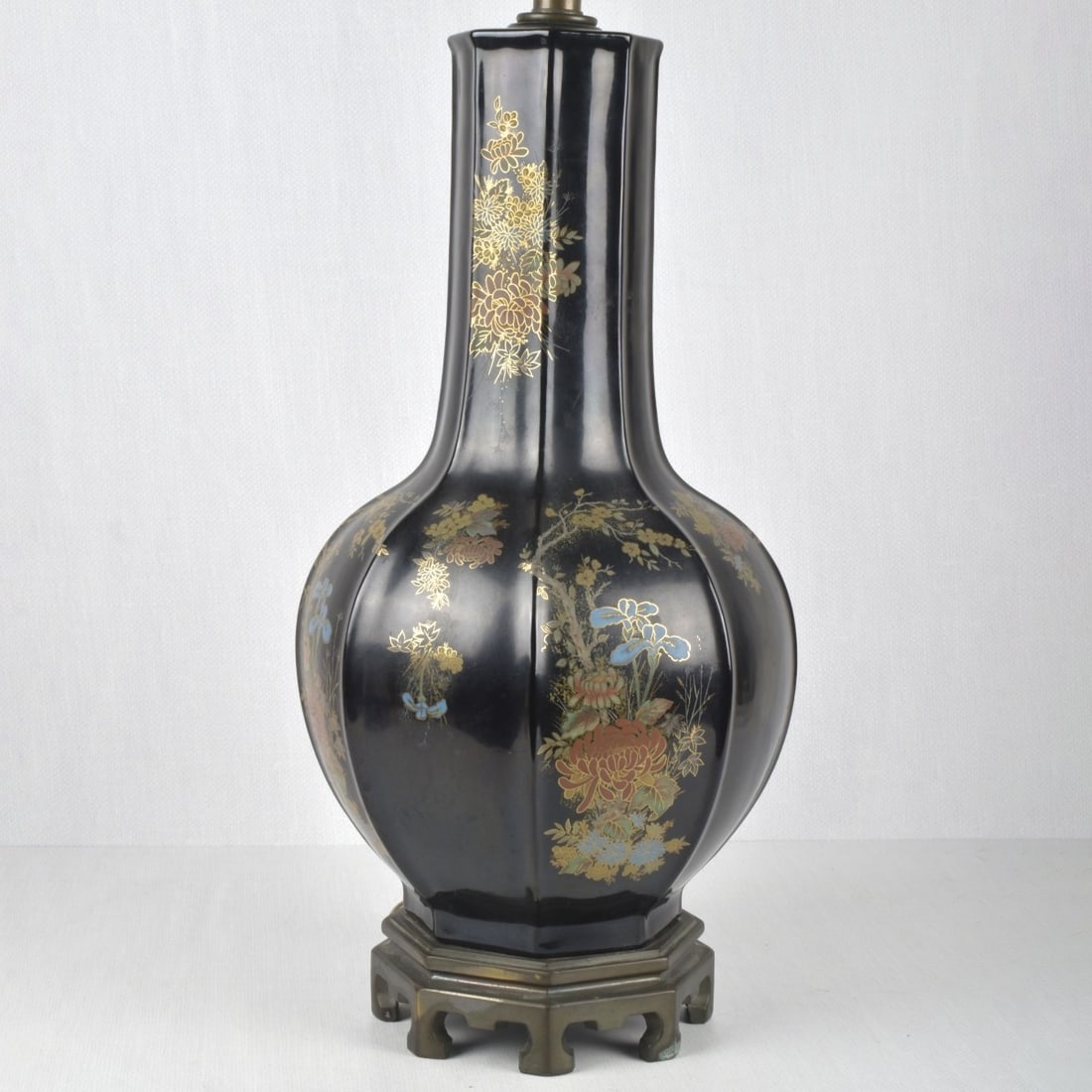 Chinese Chinoiserie-style Lamp: 1960's Chinese Chinoiserie-style Hand Painted Porcelain Table Octagon Shape Lamp with Painted Flowers with Gold Highlights. Mounted on a metal base. From bottom of base to top of porcelain measures: