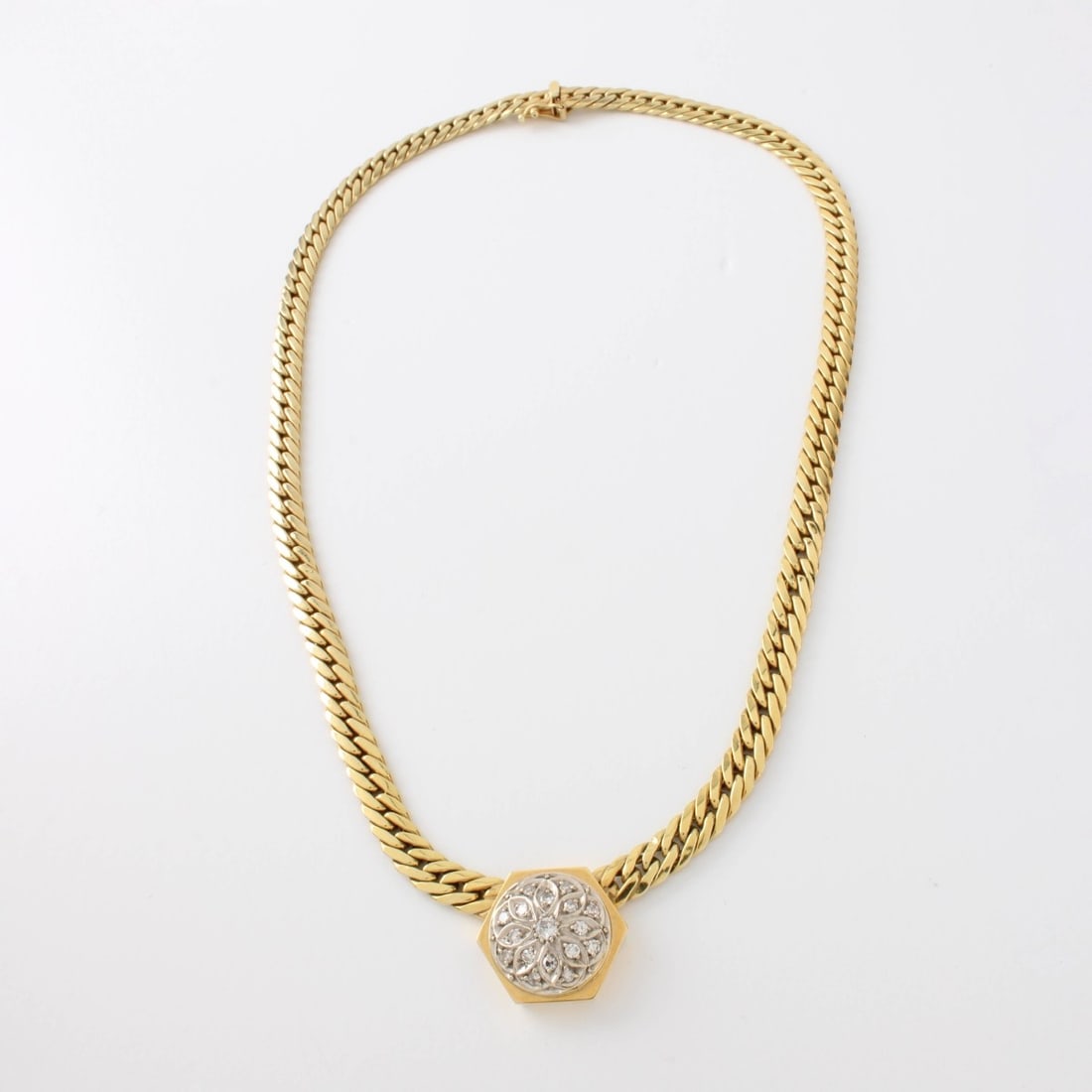 Diamond and 14K Necklace: Vintage Diamond and 14 Karat Yellow Gold Herringbone Link Pendant Necklace. The hexagonal shape pendant is set with approx. .45 carat TW single cut diamonds, H-I color, SI1-SI2 clarity. Measures